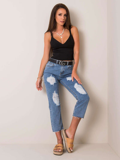 Niebieskie jeansy mom z dziurami