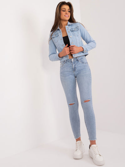 Niebieskie dopasowane jeansy damskie
