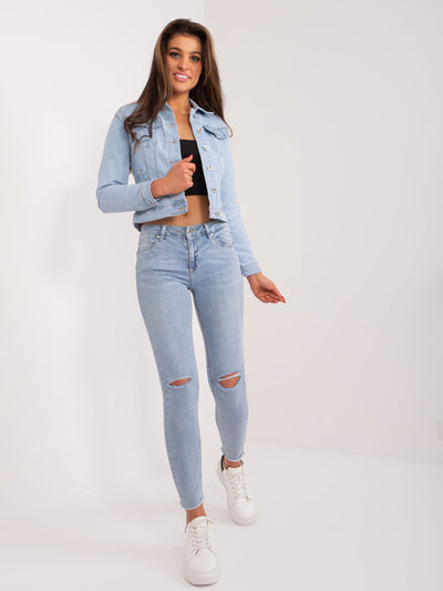 Niebieskie dopasowane jeansy damskie