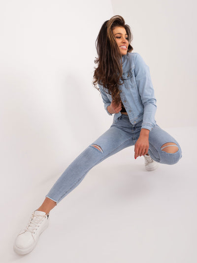 Niebieskie dopasowane jeansy damskie