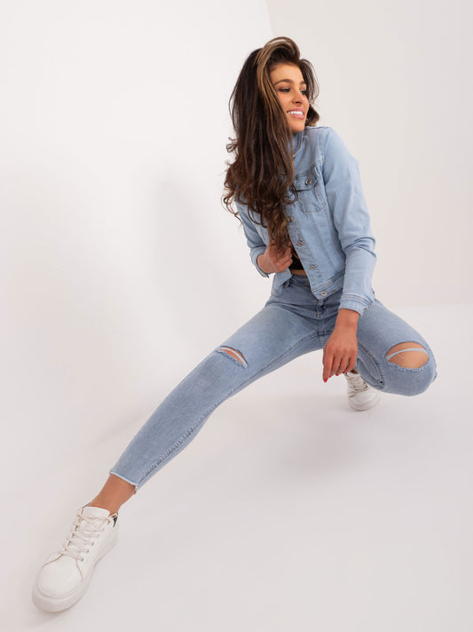 Niebieskie dopasowane jeansy damskie