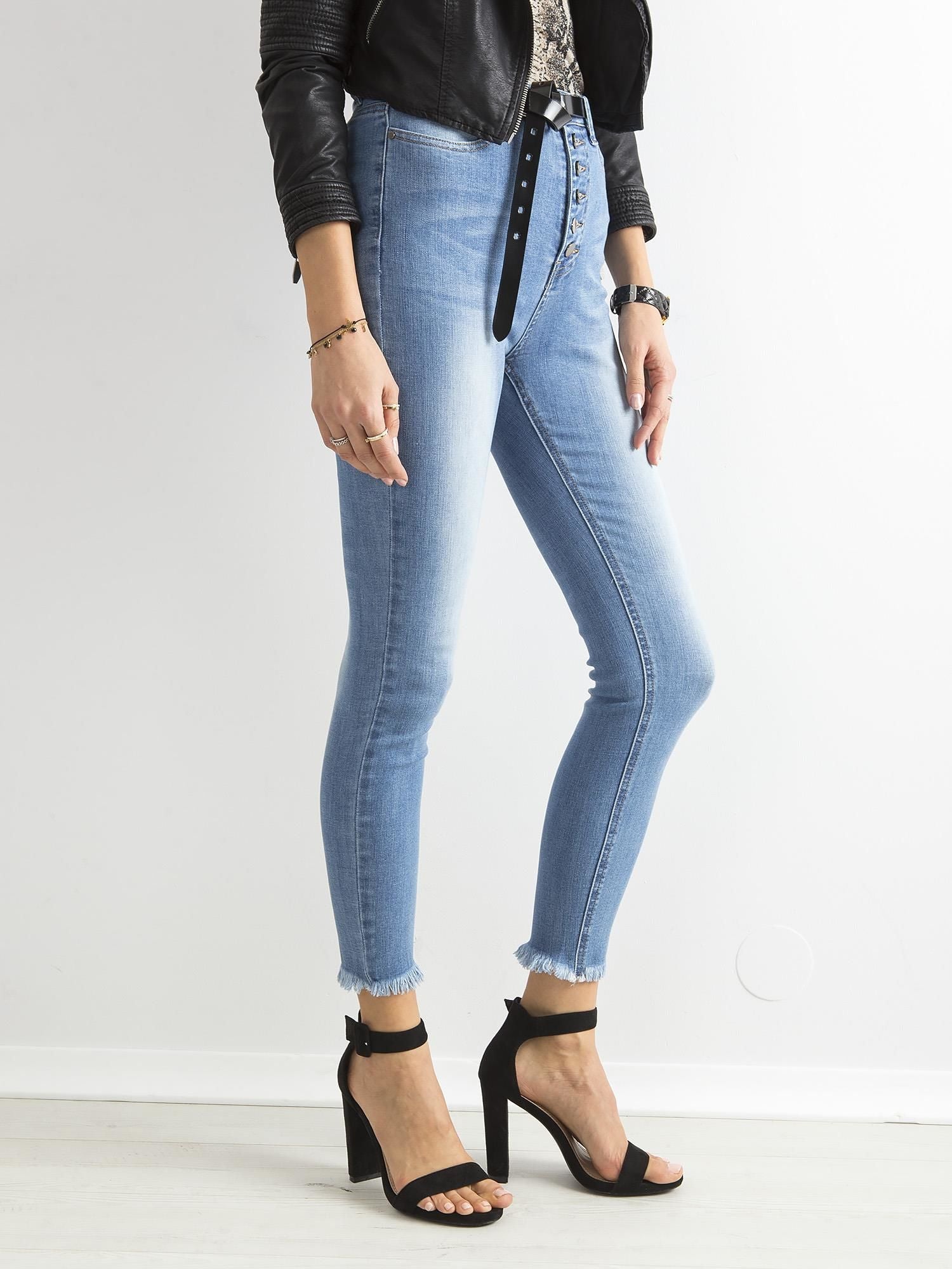 Przecierane jeansy high waist z guzikami niebieskie
