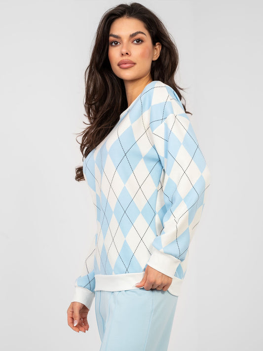 Pastelowa niebieska bluza w geometryczne wzory