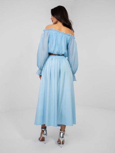 Pastelowa niebieska elegancka spódnica midi