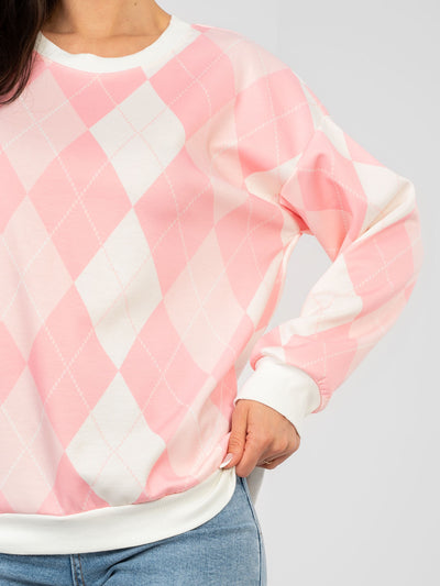 Pastelowa różowa bluza oversize w romby