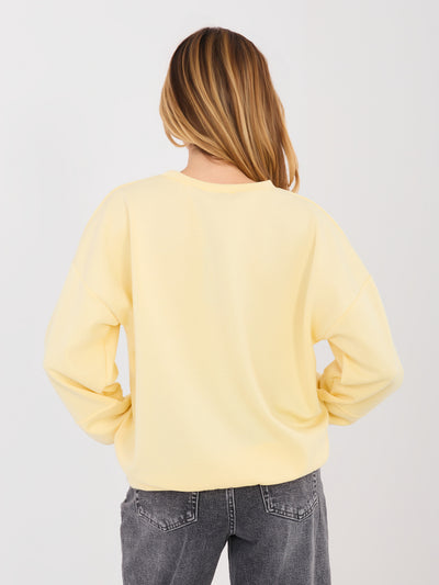 RUE PARIS Pastelowa żółta bluza z kontrastowym napisem
