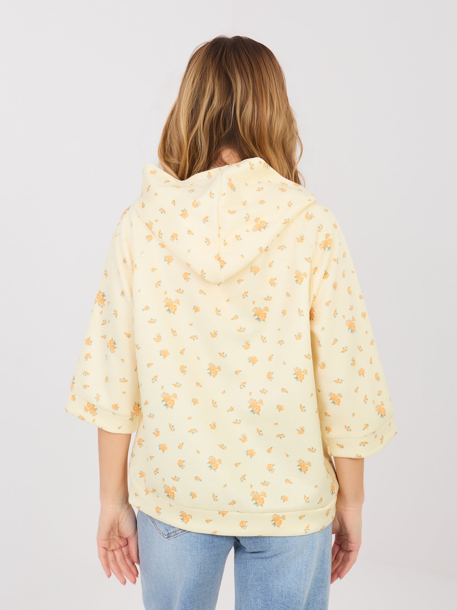 Pastelowa żółta damska bluza oversize w kwiatki