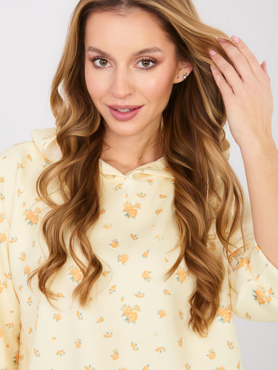 Pastelowa żółta damska bluza oversize w kwiatki