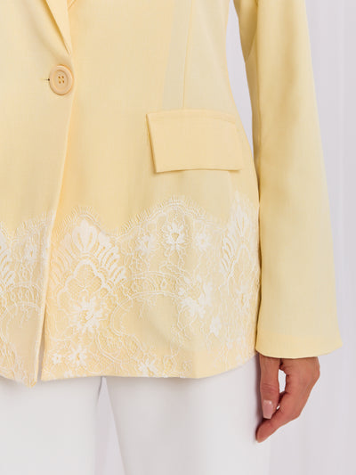 Pastelowa żółta elegancka marynarka z koronką