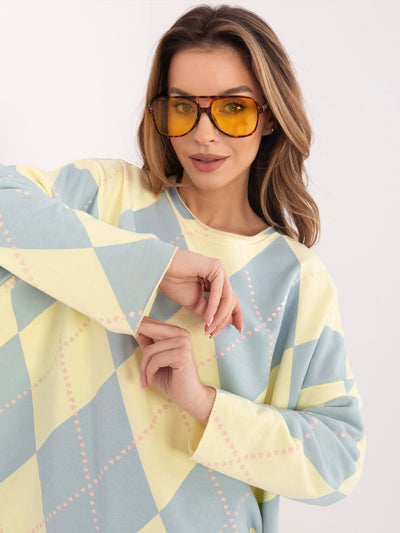 Pastelowa żółto-niebieska bluza oversize z printem