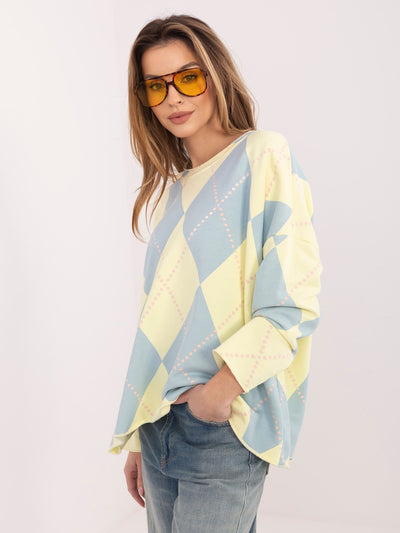 Pastelowa żółto-niebieska bluza oversize z printem