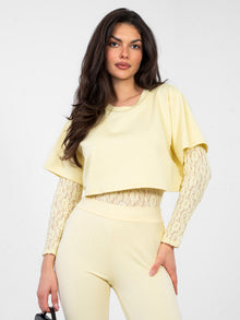 Pastelowe żółte damskie body z wszytym t-shirtem
