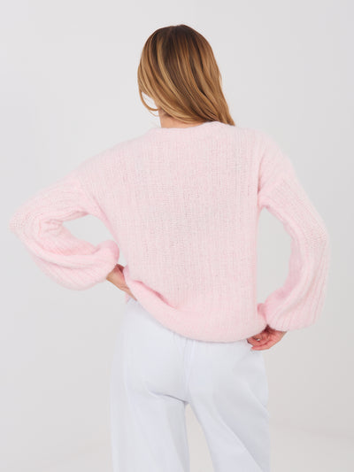 Pastelowy różowy sweter z bufiastymi rękawami