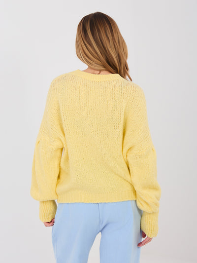 Pastelowy żółty damski sweter oversize