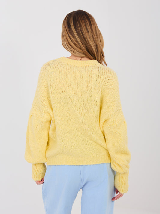 Pastelowy żółty damski sweter oversize