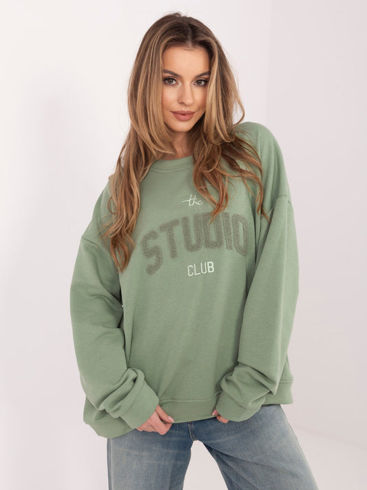 Pistacjowa bluza oversize z kontrastowym napisem