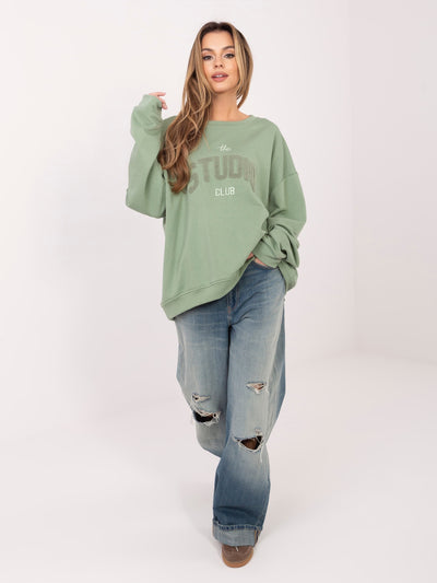 Pistacjowa bluza oversize z kontrastowym napisem