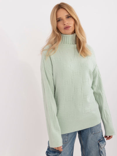 Pistacjowy damski sweter golf we wzory