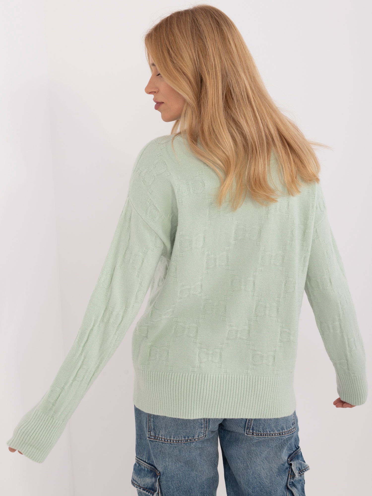 Pistacjowy damski sweter golf we wzory