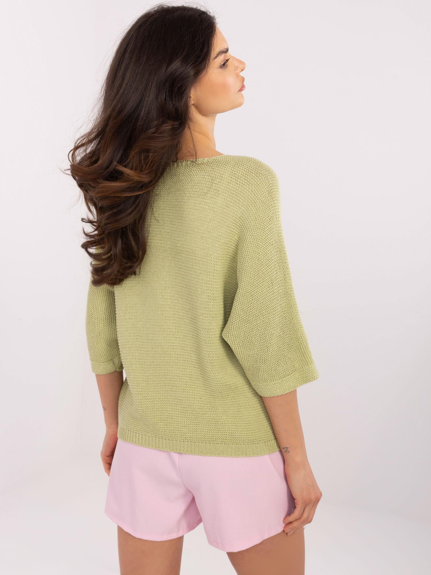 Pistacjowy sweter oversize z rękawem 3/4