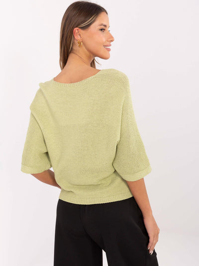 Pistacjowy damski sweter nietoperz z napisami