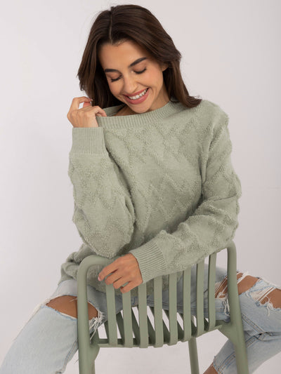 Pistacjowy damski sweter o kroju oversize