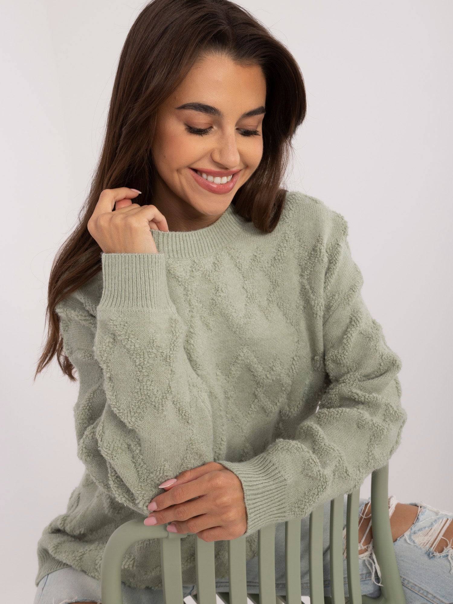 Pistacjowy damski sweter o kroju oversize