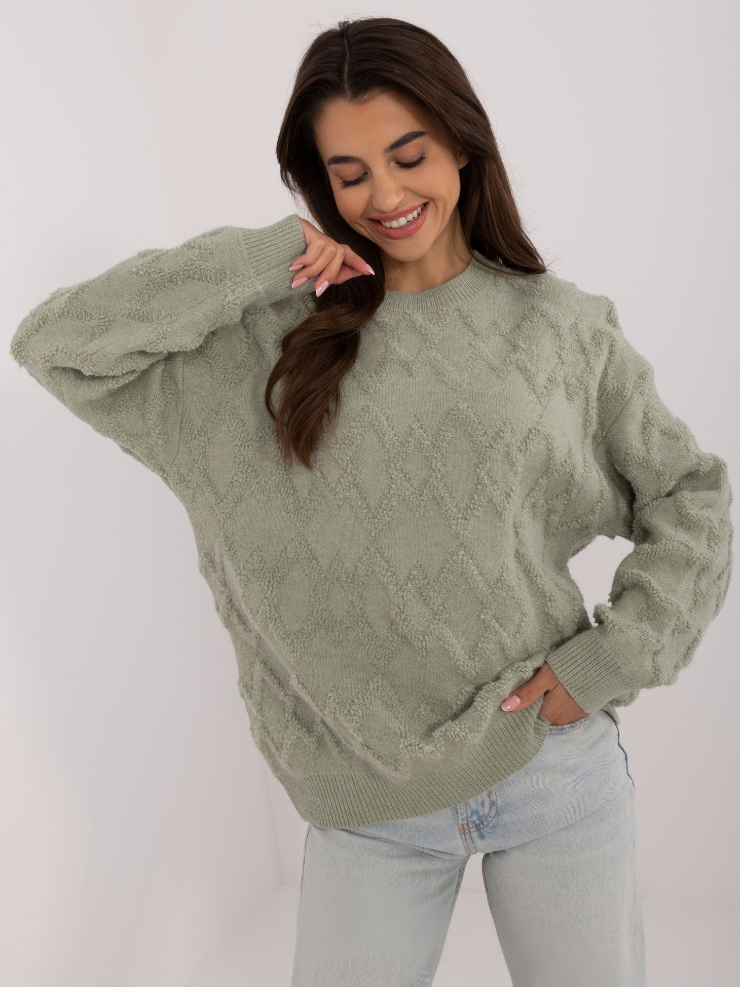 Pistacjowy damski sweter o kroju oversize