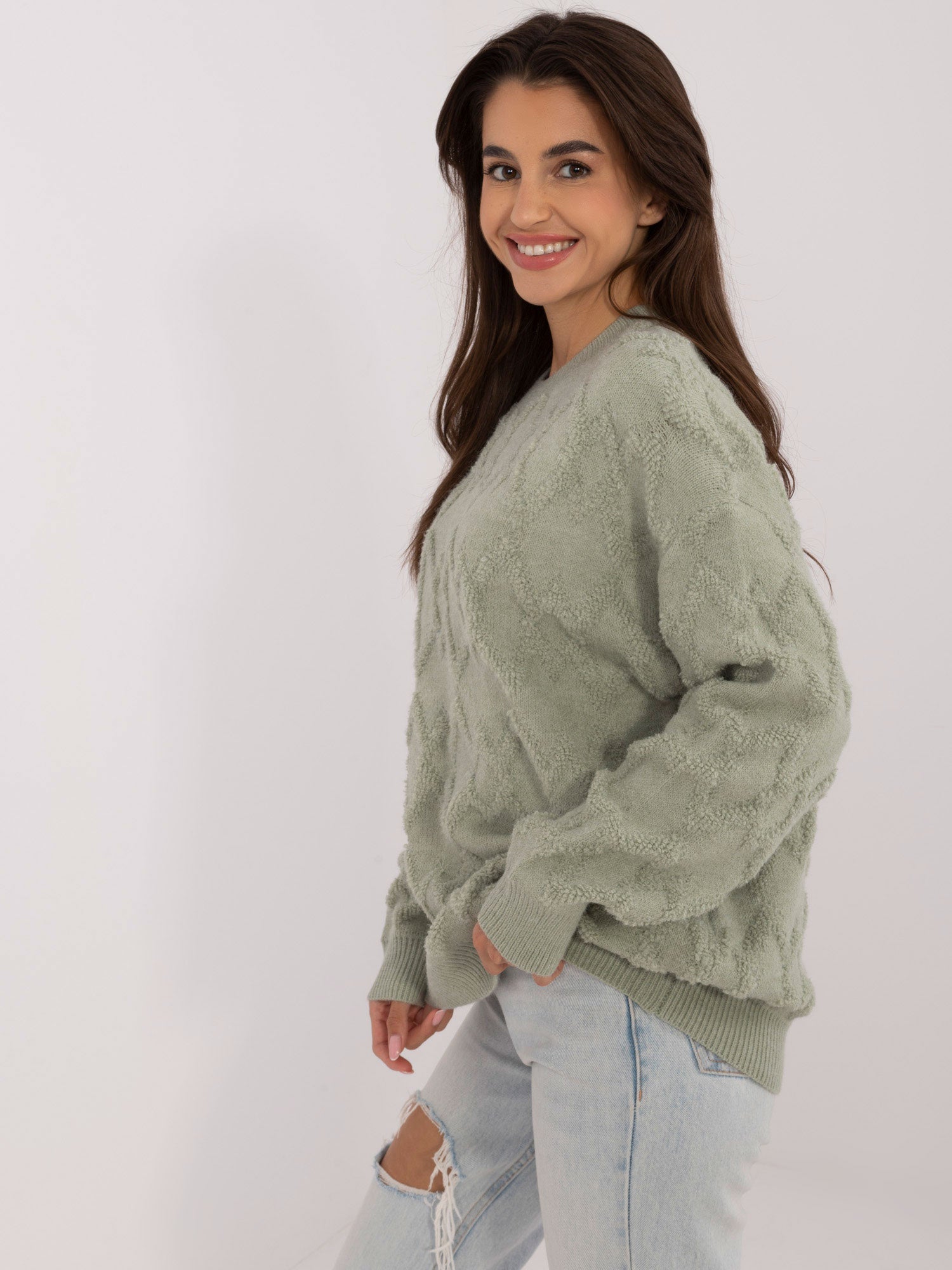 Pistacjowy damski sweter o kroju oversize