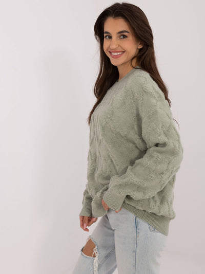 Pistacjowy damski sweter o kroju oversize