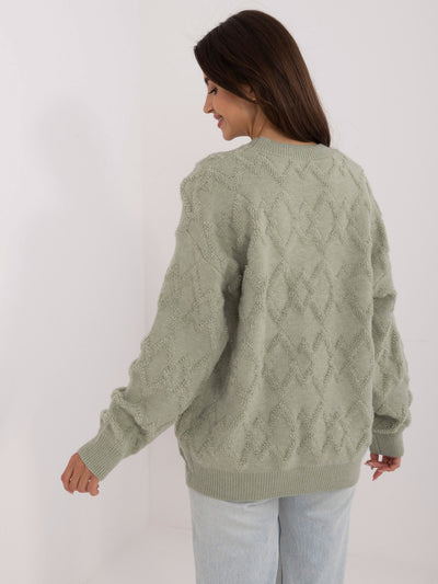 Pistacjowy damski sweter o kroju oversize