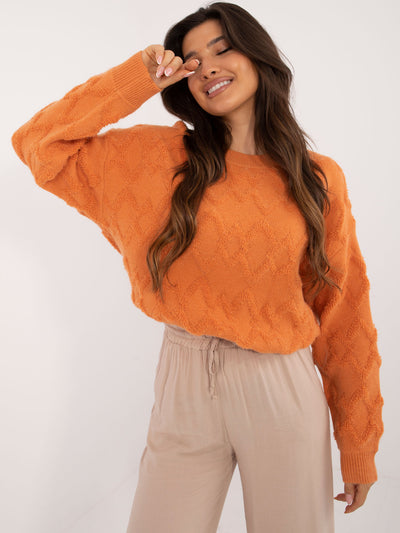 Pomarańczowy sweter oversize z okrągłym dekoltem