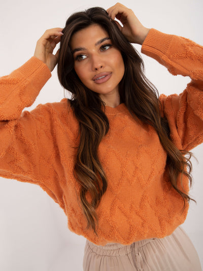 Pomarańczowy sweter oversize z okrągłym dekoltem