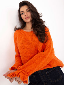 Pomarańczowy sweter z falbankami przy rękawach