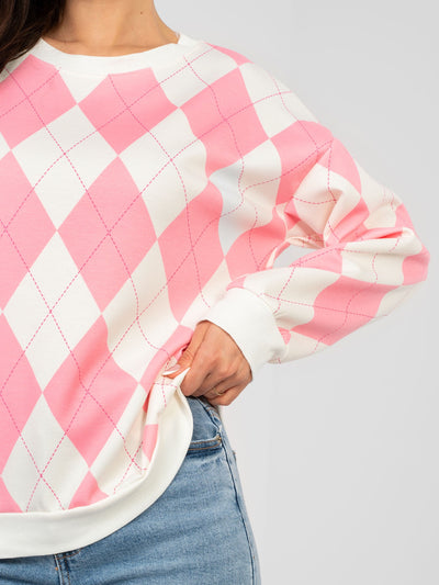 Różowa bluza oversize w geometryczne wzory