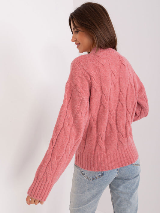 Różowy sweter z warkoczami i ściągaczami