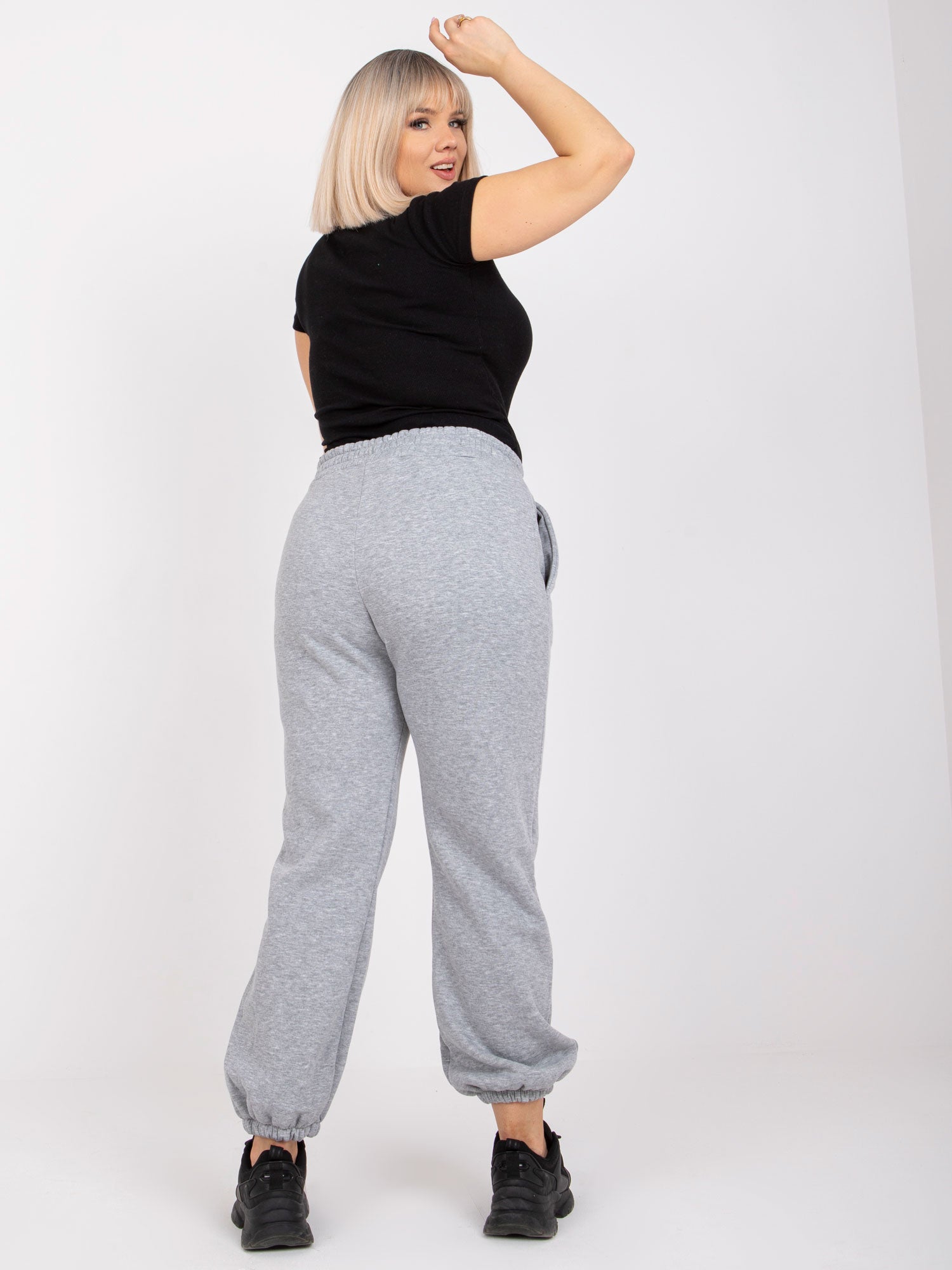 Szare melanżowe dresowe spodnie plus size