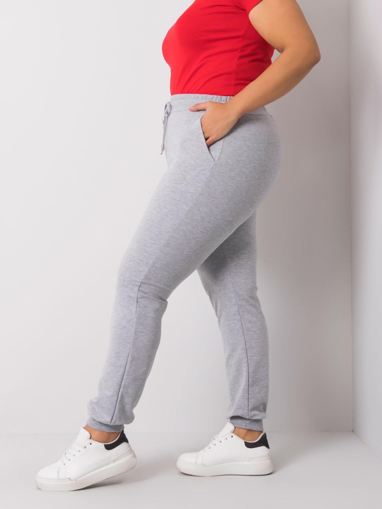 Szare melanżowe damskie spodnie dresowe plus size