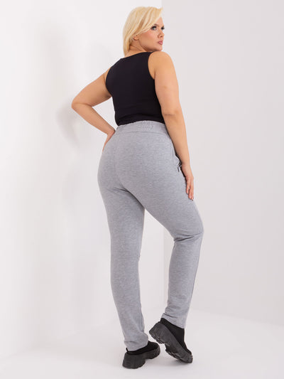 Szare melanżowe spodnie plus size z naszywką
