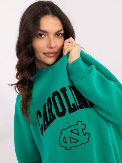 Turkusowa dresowa bluza bez kaptura z naszywkami