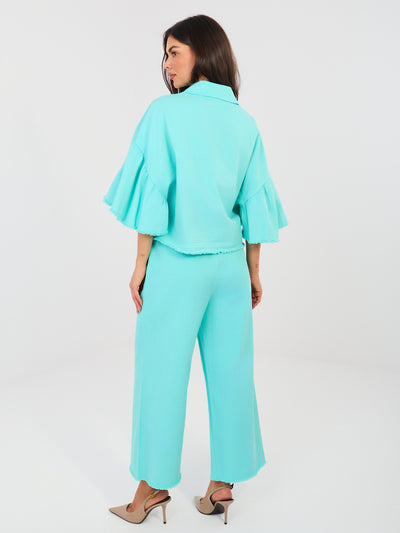 Turkusowe jeansy wide leg bez zapięcia