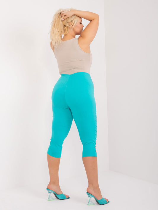 Turkusowe spodnie rybaczki plus size bez zapięcia