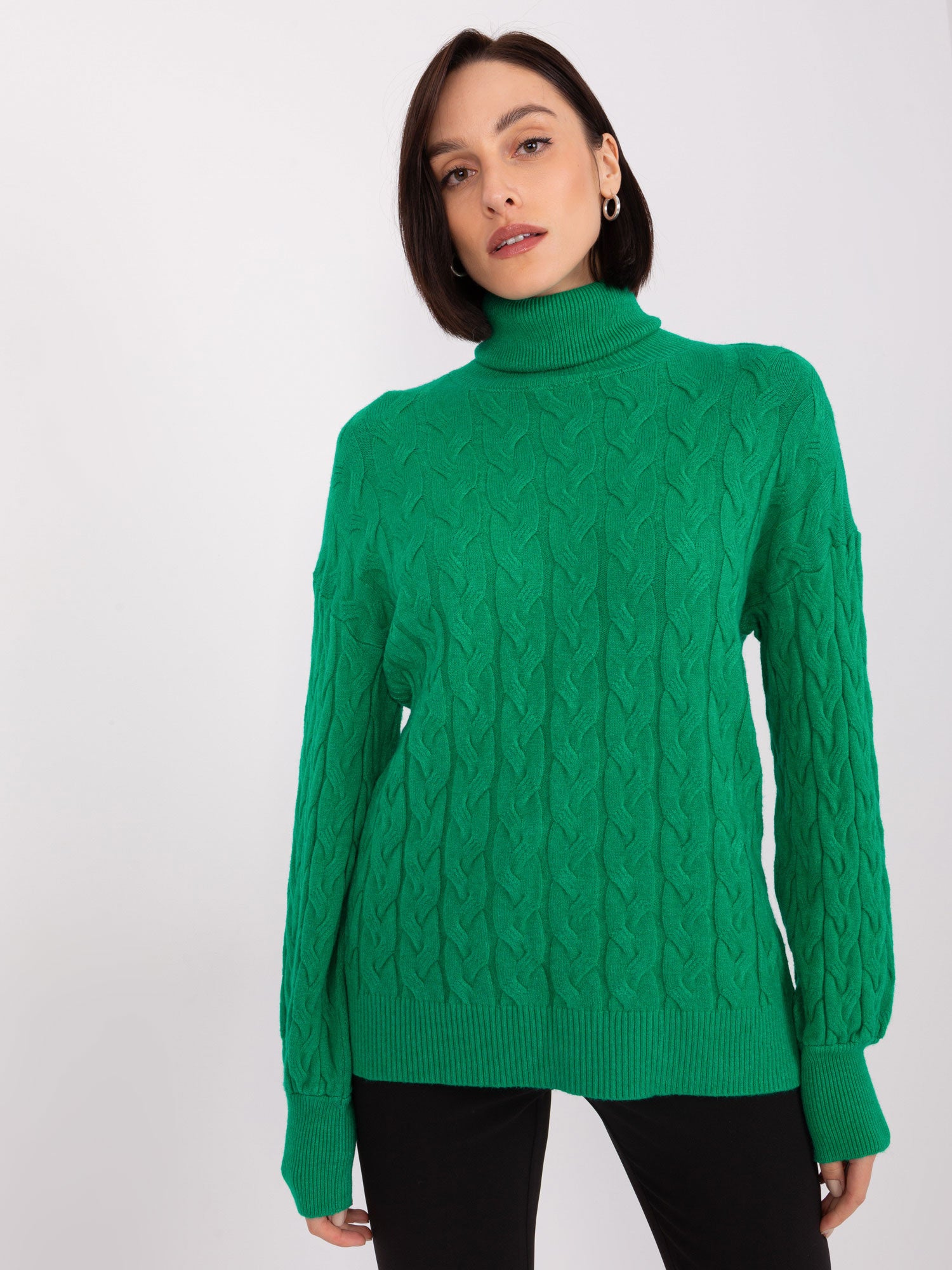 Zielony sweter golf damski z warkoczami