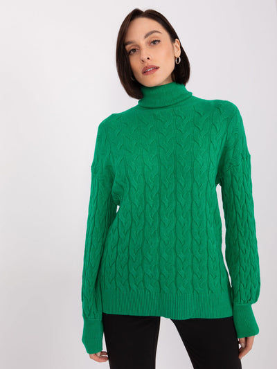 Zielony sweter golf damski z warkoczami