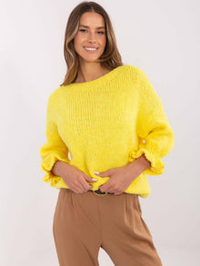 Żółty damski sweter oversize w jednolitym kolorze