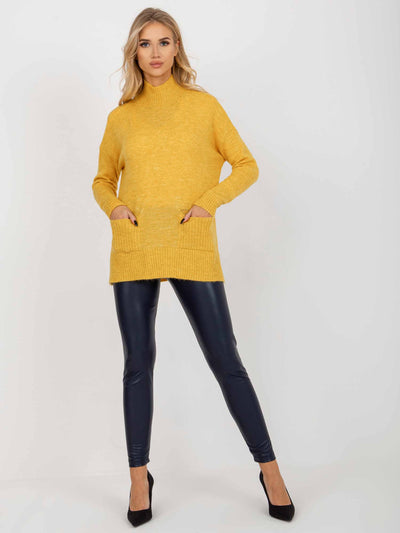 Żółty długi sweter oversize z kieszeniami