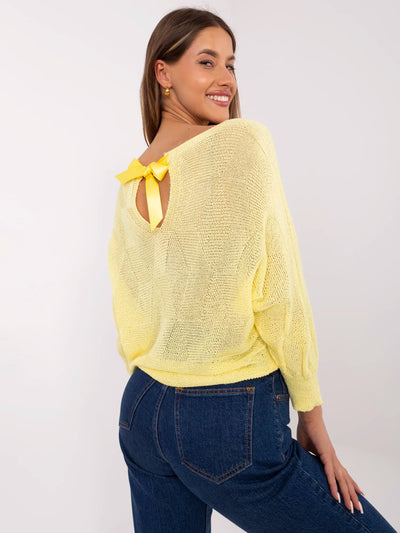 Żółty damski sweter oversize w romby